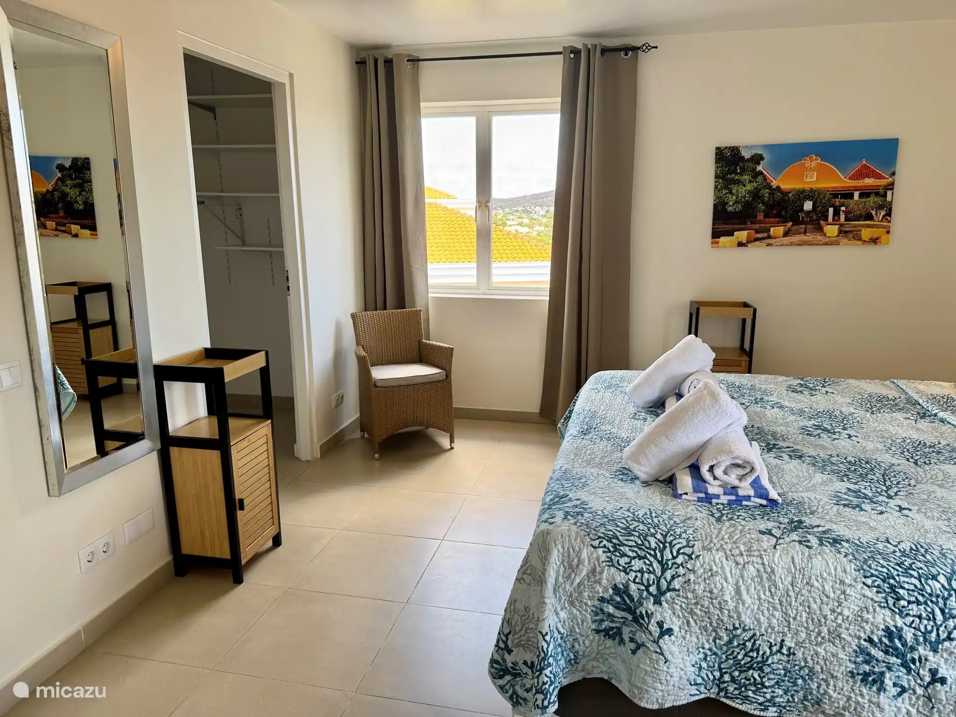 Master bedroom with bathroom and walk-in closet 