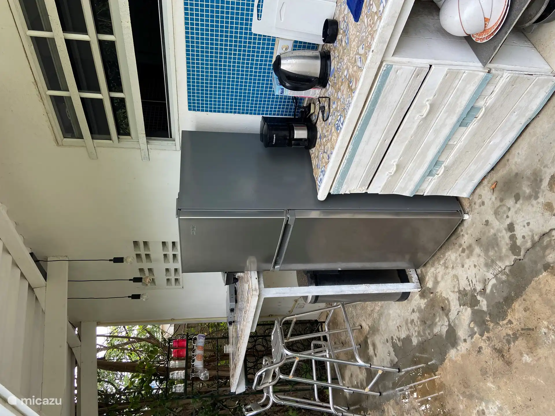 Outdoor kitchen with spacious fridge and freezer compartment