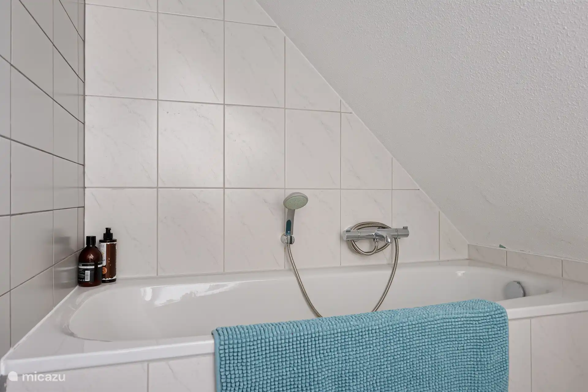 Bathtub in the bathroom 