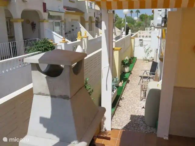 casa vacacional en España, Costa Blanca, Orihuela Costa – Casa Ooms internet fibra optica gratis Jardín lateral.