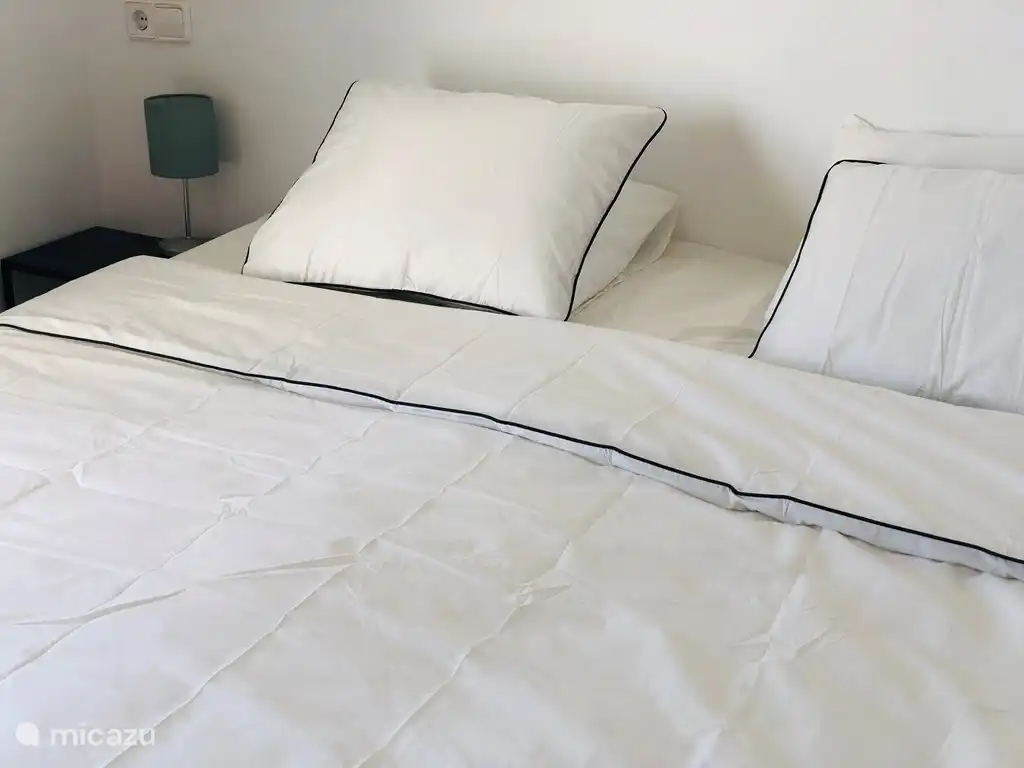 Hauptschlafzimmer mit Doppelbett