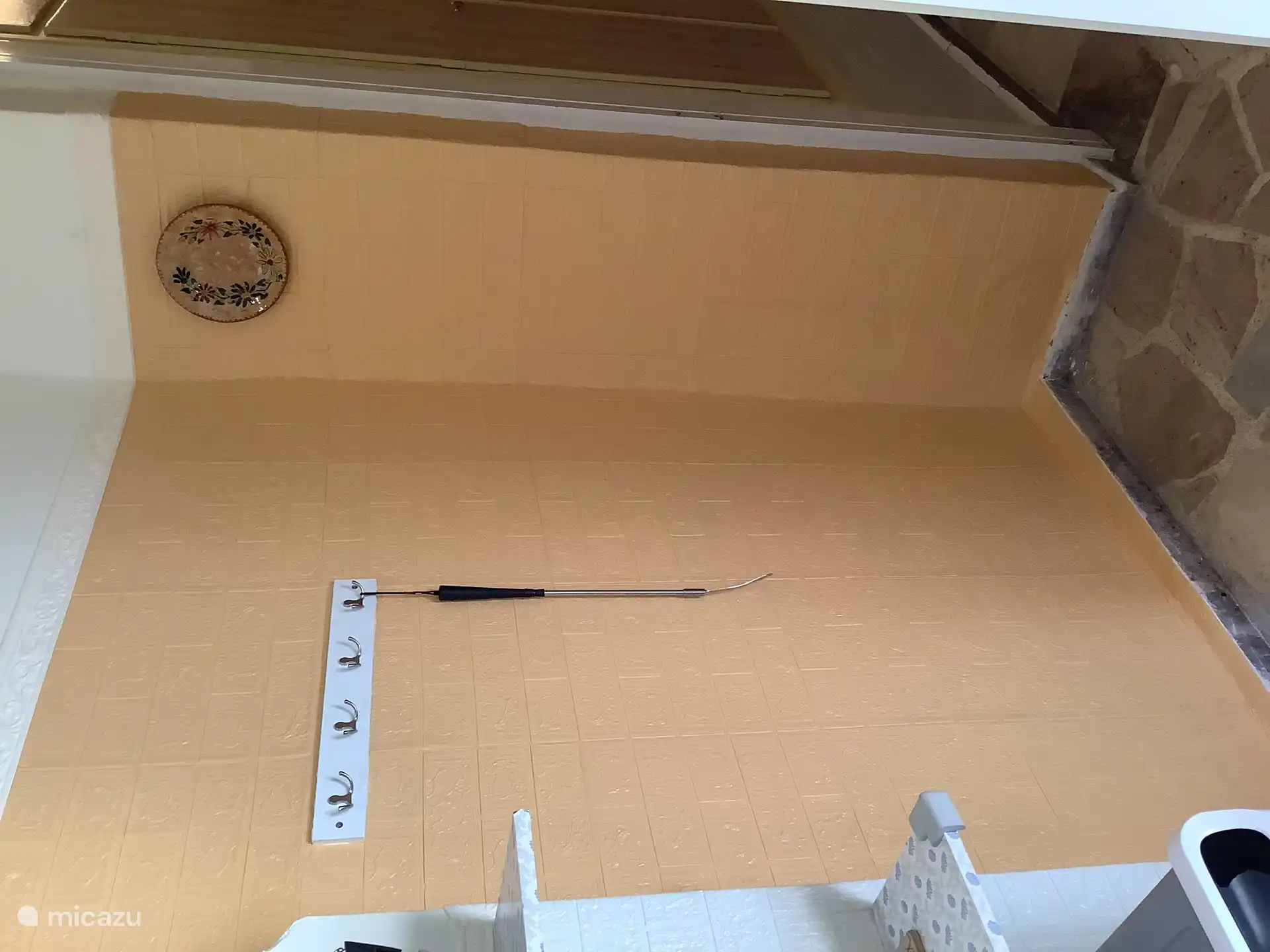 De hal met de kapstok.