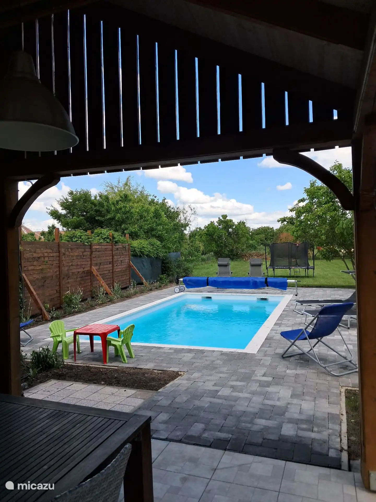 Private pool. View from covered terrace with jacuzzi.