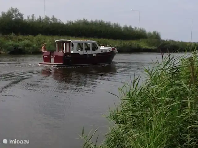 Location de Vacances Pays-Bas, Hollande du Nord, Schoorldam, bungalow - Rekere 111 à Schoorldam bateau sur le canal derrière le bungalow
