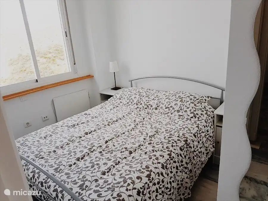 Schlafzimmer mit Doppelbett