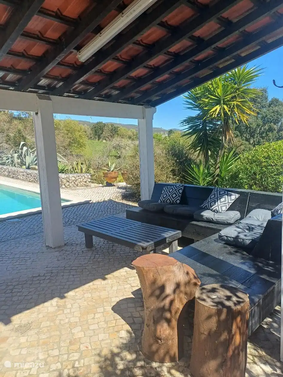 Lovely lounge sofa under the canopy