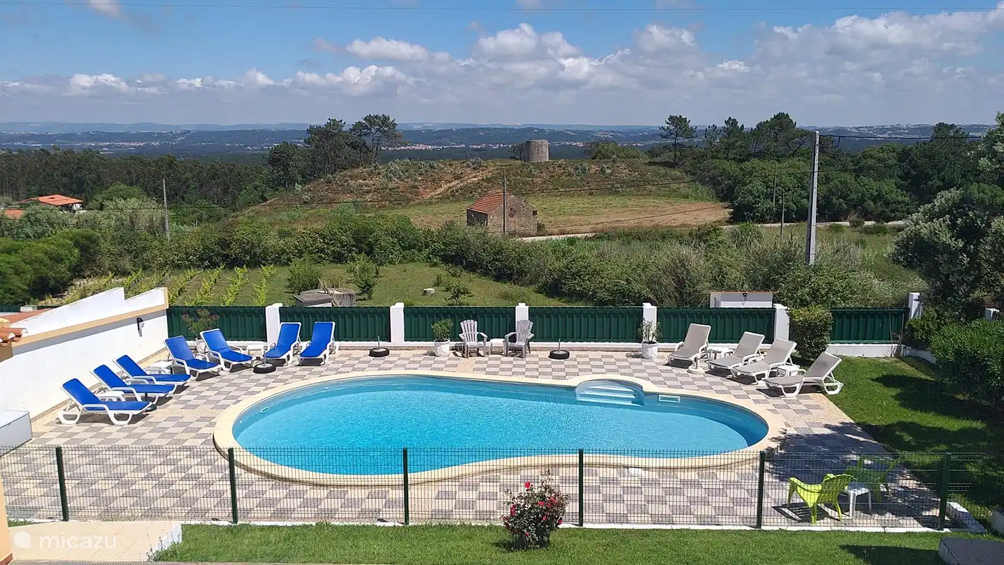 swimming pool with sunbathing terrace