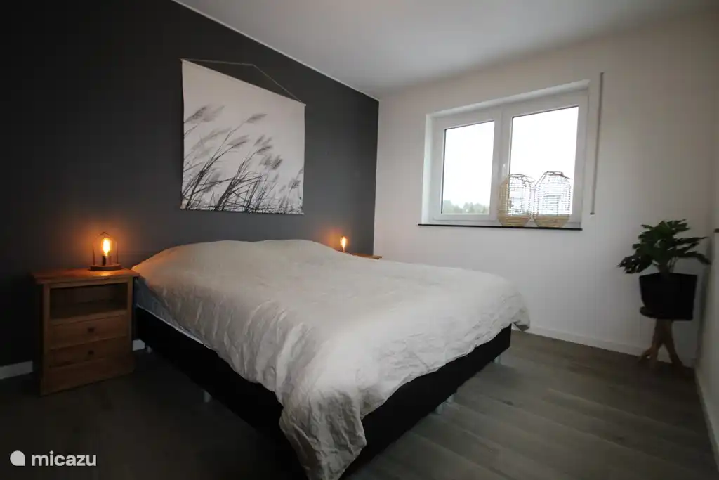 You can sleep on a generous box-spring bed.