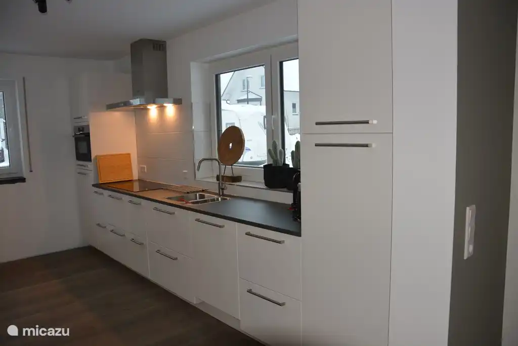 The kitchen is equipped with all modern kitchen appliances