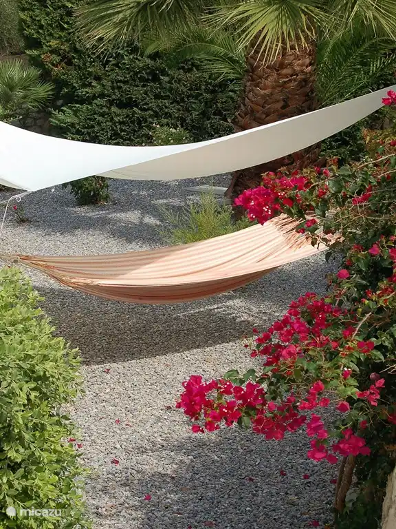To relax in the hammock in the beautiful garden. The garden is completely private!