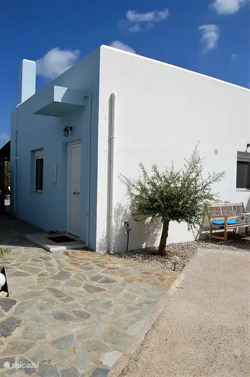 Front door with access to Patio (left) You can park on the side.