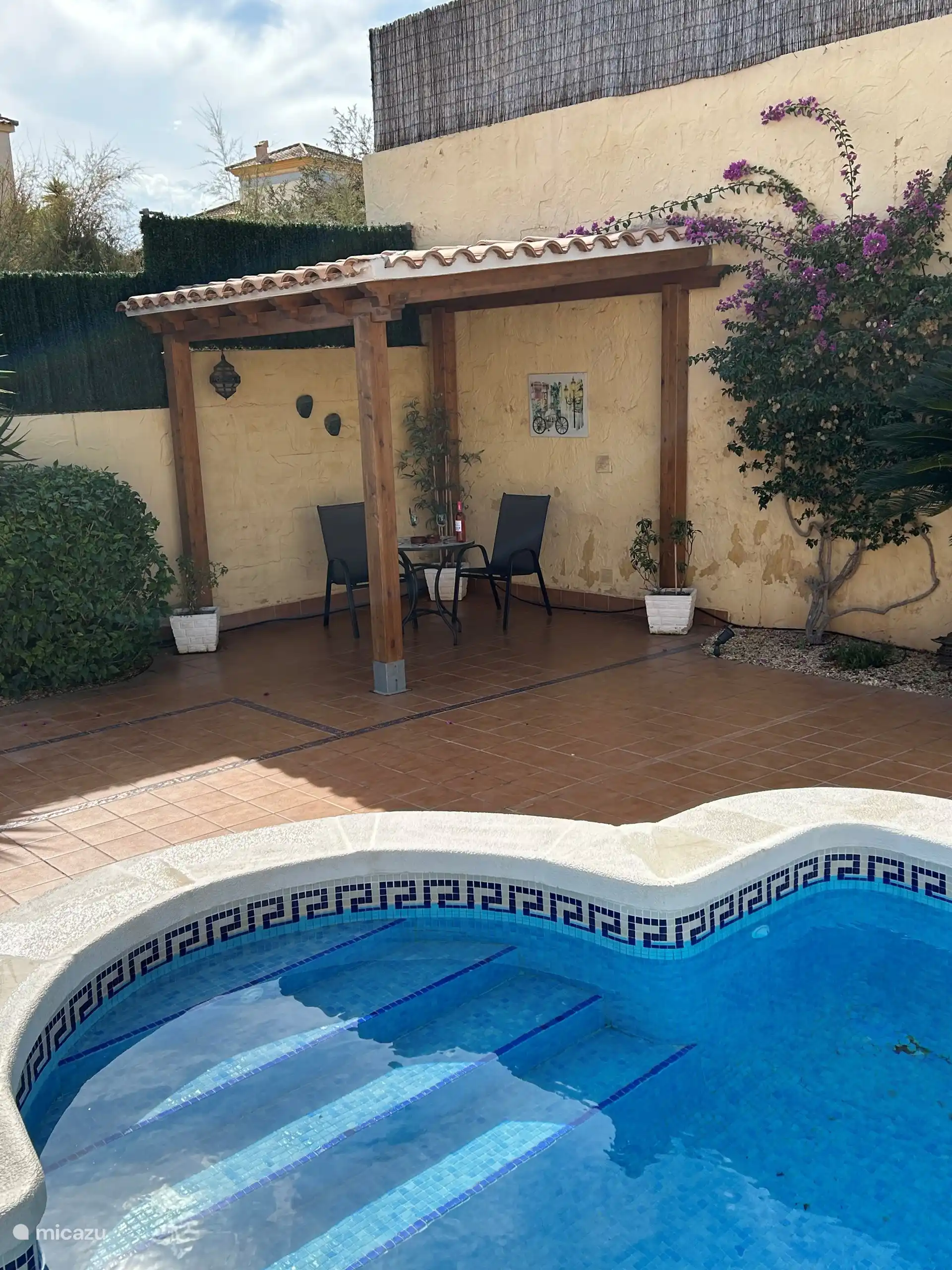 Pergola by the pool for the necessary shade