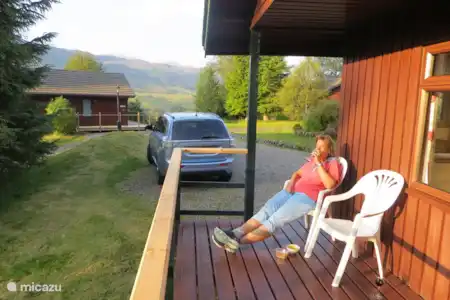 Vakantiehuis Groot-Brittannië, Schotland – vakantiehuis Heron Op de veranda aan het genieten van de middagzon.