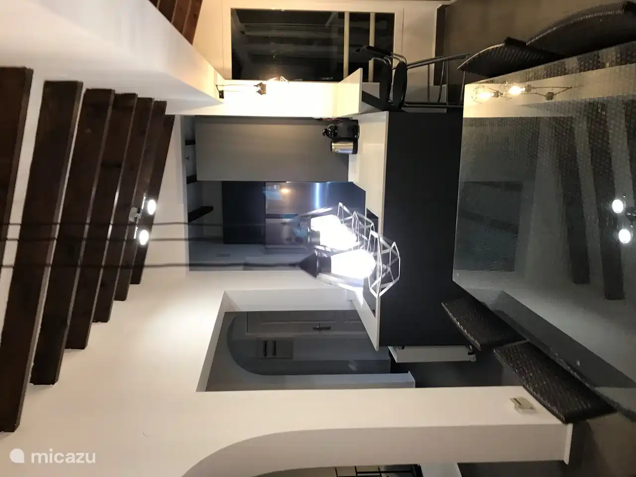 modern kitchen with various types of lighting