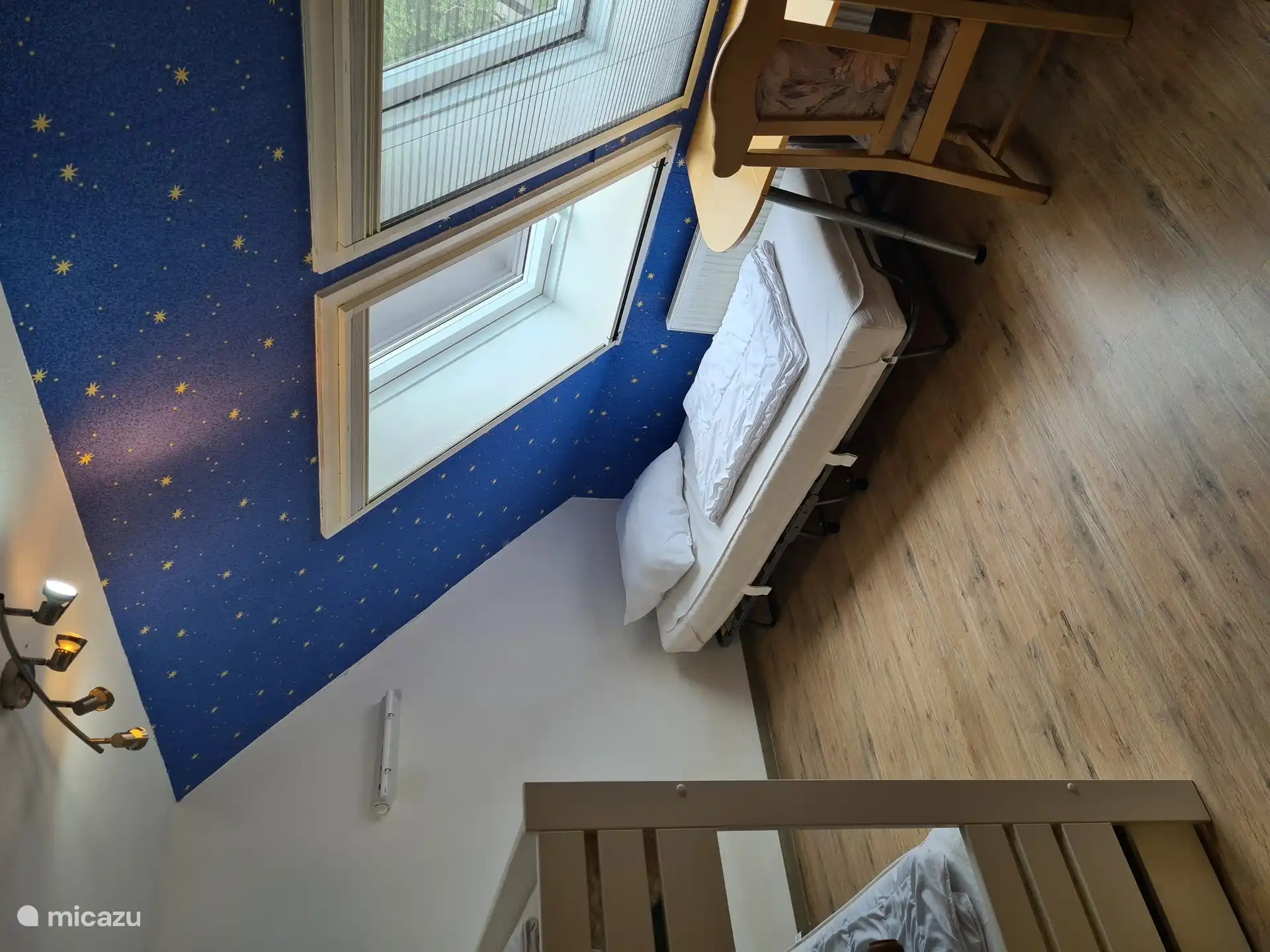 Bedroom 3, with bunk beds and separate bed.