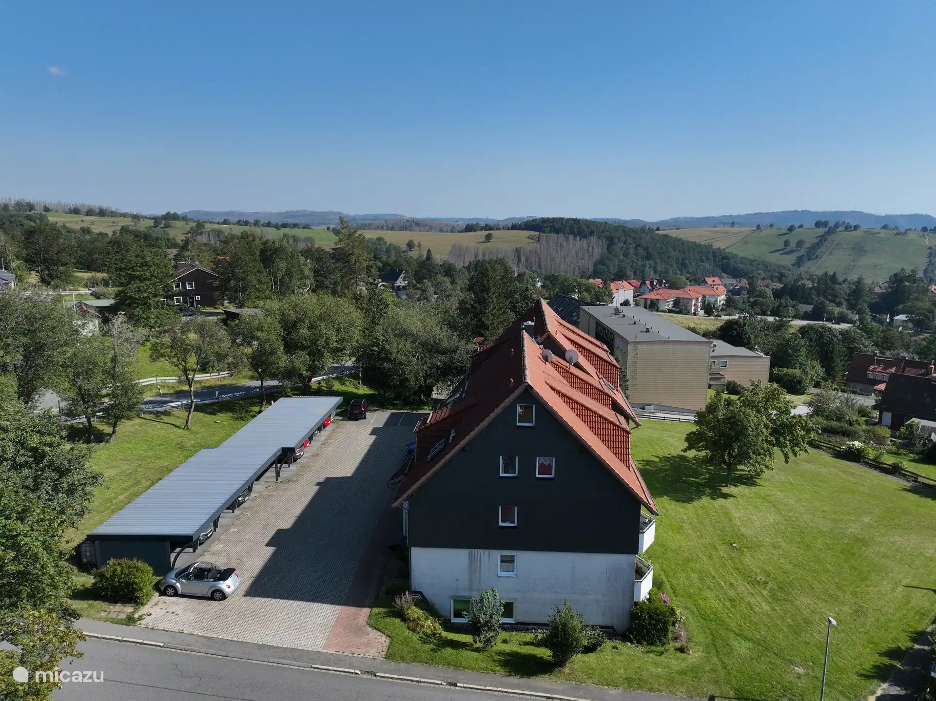 Courtyard/ parking and entrance.