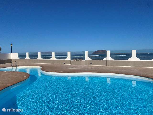 Vakantiehuis Spanje, Fuerteventura, Corralejo - vakantiehuis Huis50m van zee+pool+tuin+dakterras 