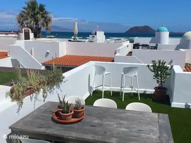 Maison50m de la mer+piscine+jardin+terrasse sur le toit | Espagne, Fuerteventura, Corralejo - maison de vacances Boire un verre avec vue