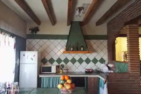 Vakantiehuis Spanje, Andalusië, Alhaurín el Grande finca Finca La Alegría Keuken met ontbijtbar