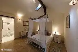 bedroom with bathroom en suite