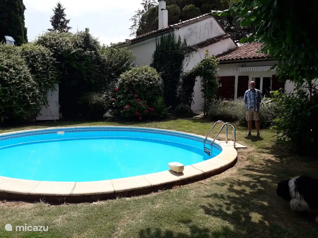 At the pool with Gite in the background