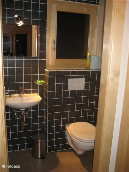 there are 3 toilets, separate from the bathroom