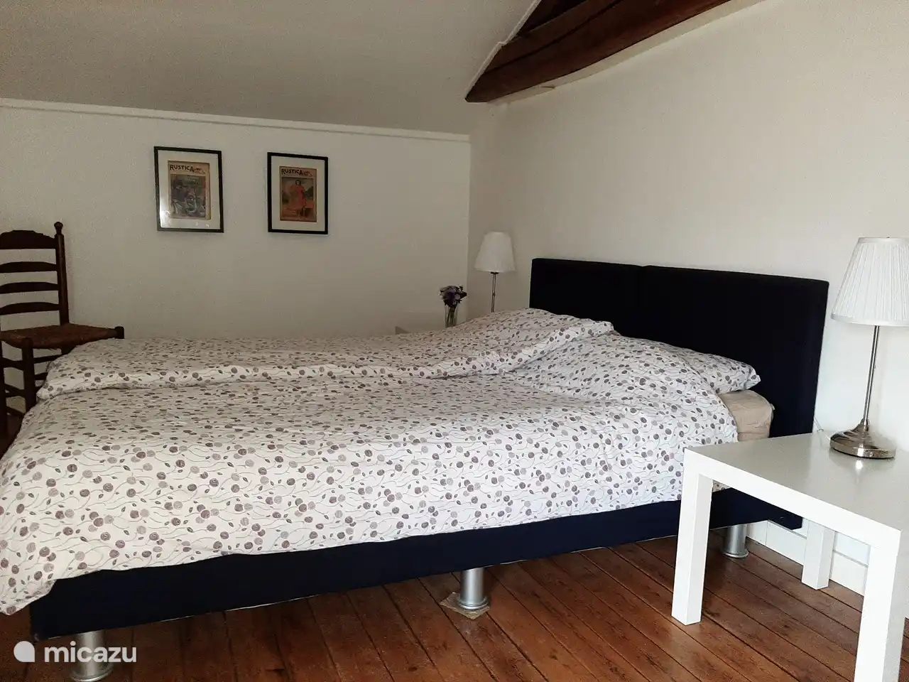 The bedroom with a double bed on the first floor