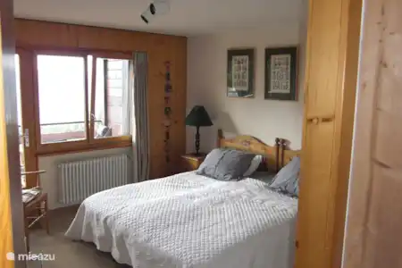 Vakantiehuis Zwitserland, Vaud, Gryon/Villars Sur Ollon penthouse Schuss slaapkamer met balkon zuid