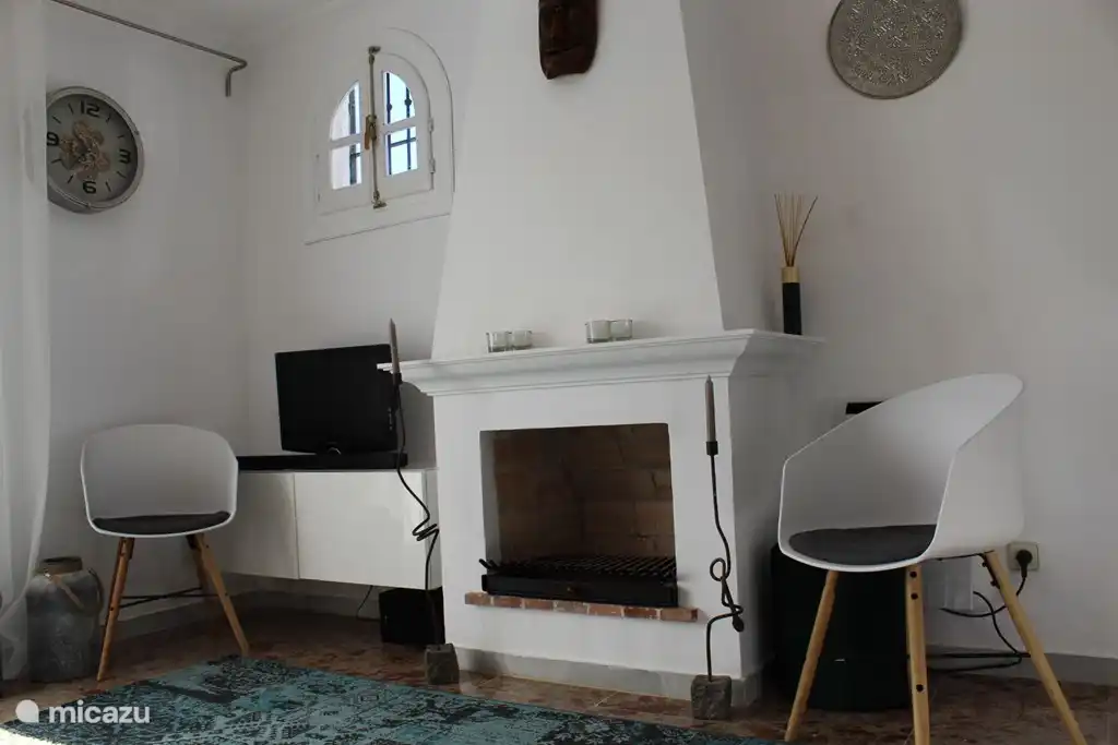 Chimenea en el centro del sal&#243;n