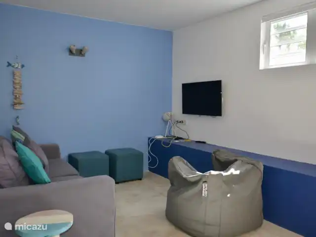 Villa Supérieure Plage Blue Bay | Curaçao, Curaçao-Centre, Blue Bay - villa Le deuxième salon au sous-sol, agréable et cool pour se détendre, jouer ou regarder un film