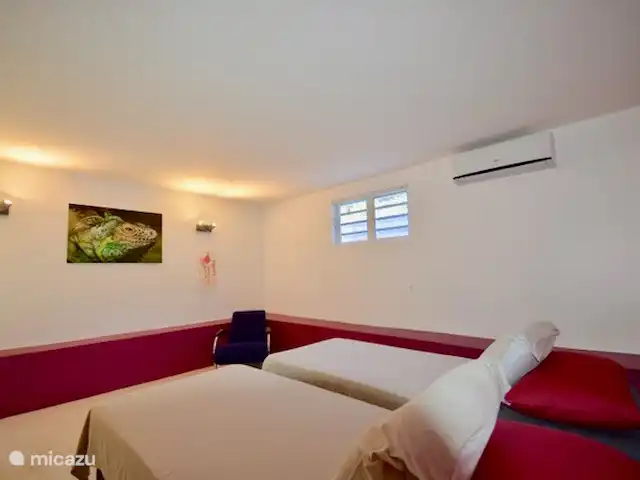 Villa Supérieure Plage Blue Bay | Curaçao, Curaçao-Centre, Blue Bay - villa Chambre #3 avec salle de bain partagée #3
Nous pouvons également transformer les 2 lits simples en un lit king size