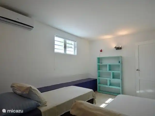 Villa Supérieure Plage Blue Bay | Curaçao, Curaçao-Centre, Blue Bay - villa Chambre #5 avec salle de bain partagée #3
Nous pouvons également transformer les 2 lits simples en un lit queen