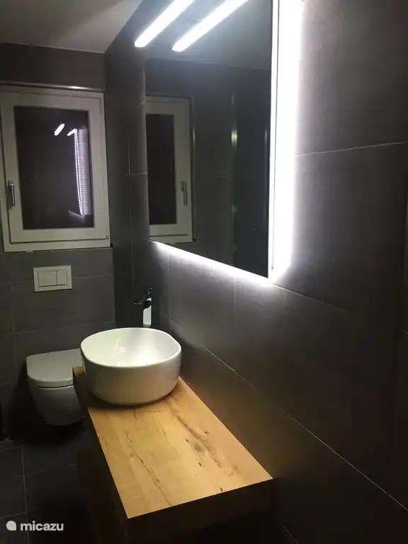 baño abajo