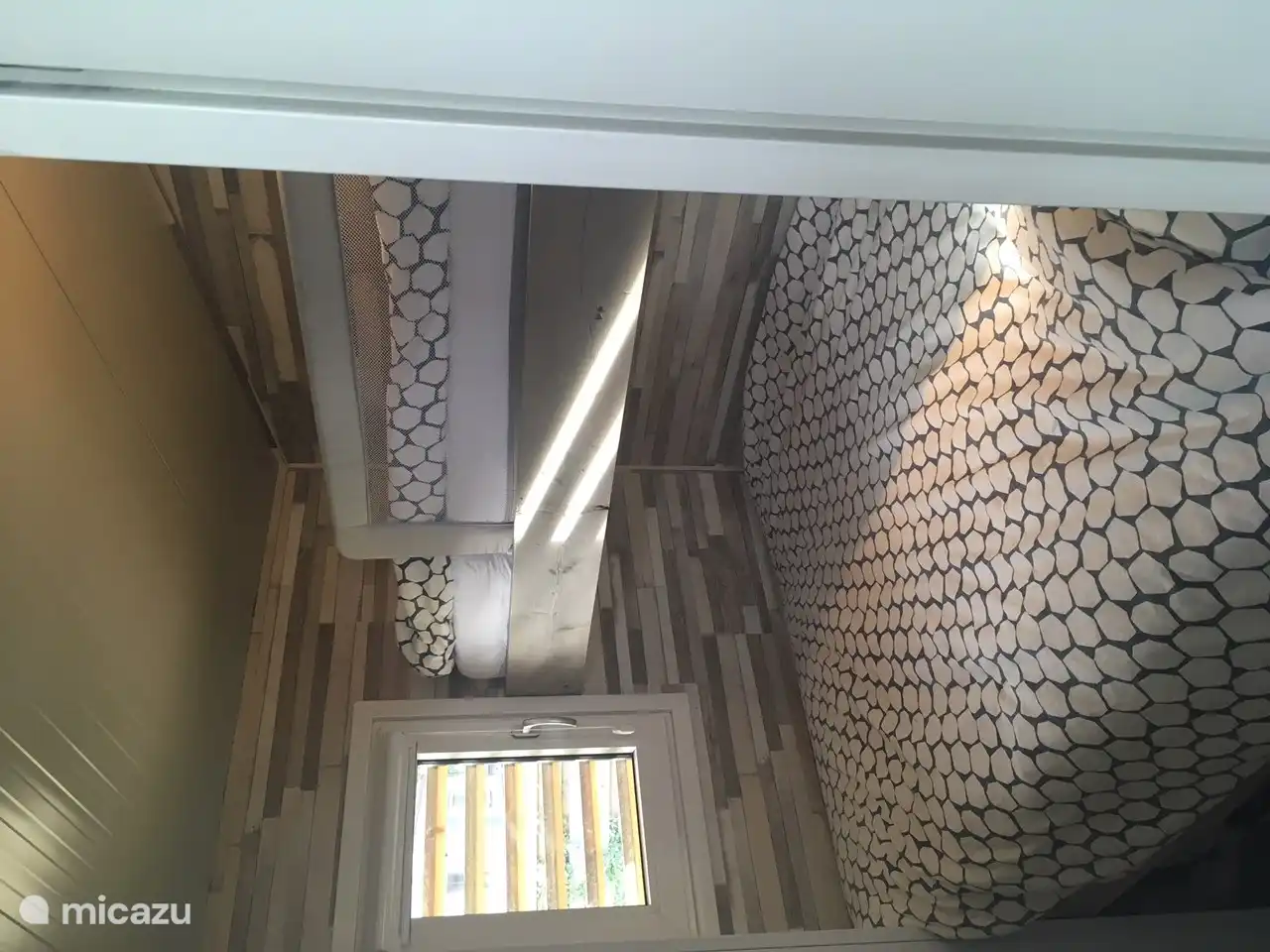 Bedroom 1, with double bed of 1.60 by 2.00 and a single bed above it 0.80 by 2.00
Removable fall protection.