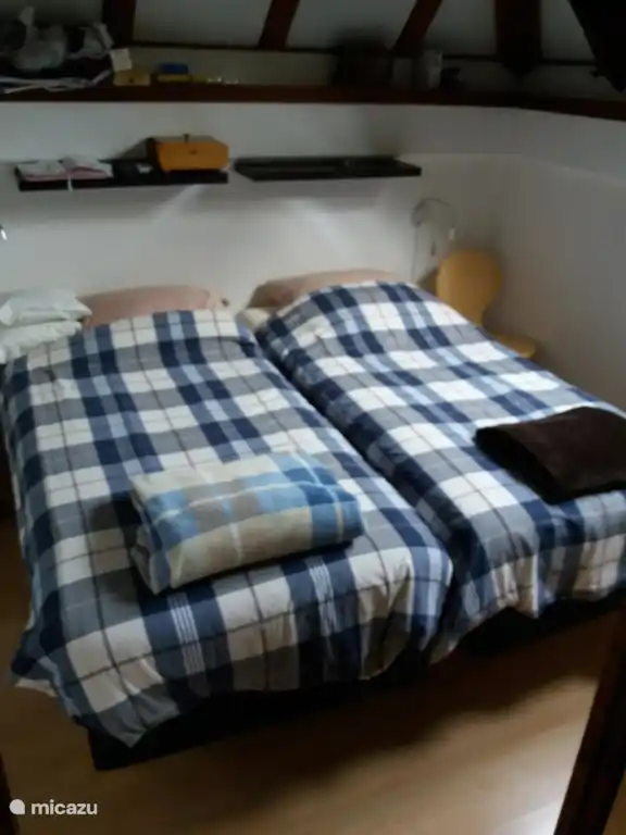 De ouderslaapkamer op de tussenverdieping