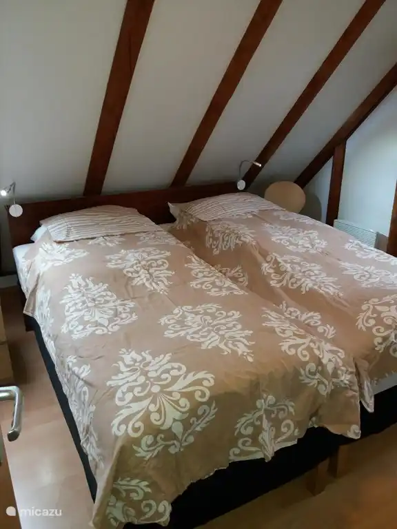 De slaapkamer op de tweede verdieping