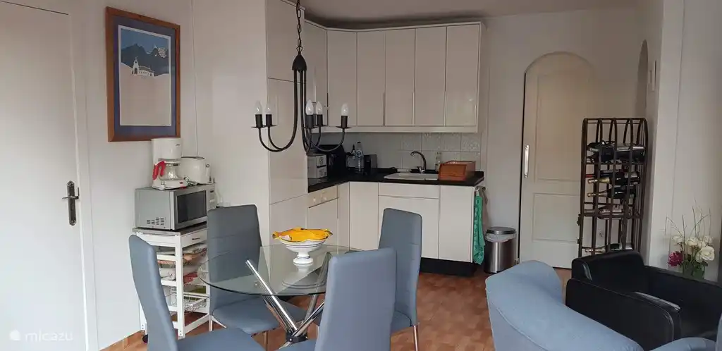 The kitchen is well equipped with a dishwasher, combi oven, airfryer, large fridge-freezer combination. 4 burner induction hob.