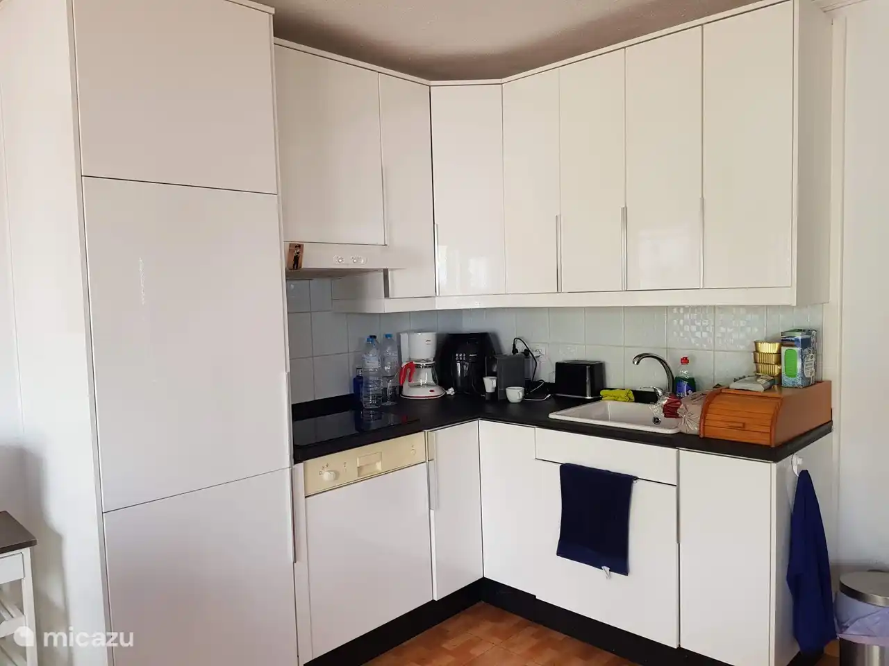 The kitchen is equipped with a dishwasher, fridge-freezer, combi oven, four-burner stove, Airfryer, Grill and sandwich irons, kettle and coffee maker app. full pan set and kitchen complete set supplies.