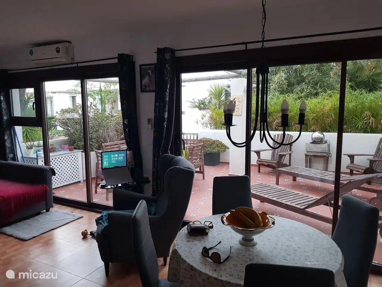 The large sliding doors bring together outside and inside