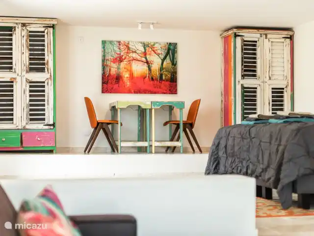 Villa Trupial huren in Curaçao, Banda Abou (west), Coral Estate, Rif St.Marie - villa Slaapkamer 4 met zithoek en kingsize bed 180x200, e een 1 persoons bed 90x200, openslaande deuren naar een terras