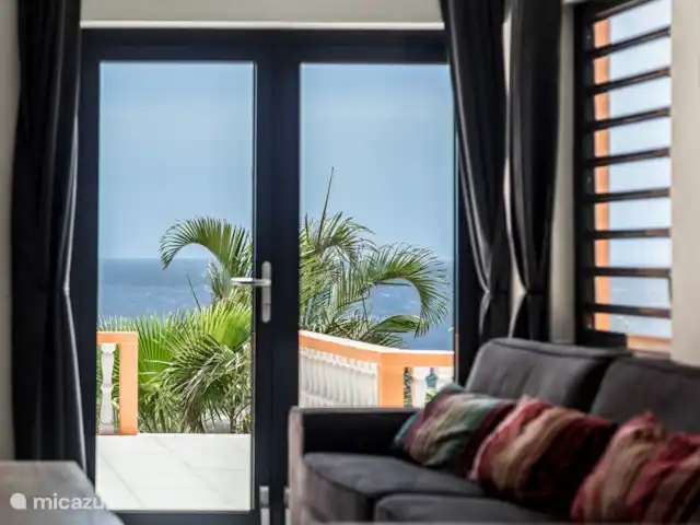 Villa Trupial huren in Curaçao, Banda Abou (west), Coral Estate, Rif St.Marie - villa Slaapkamer 4 met zithoek en kingsize bed 180x200, e een 1 persoons bed 90x200, openslaande deuren naar een terras