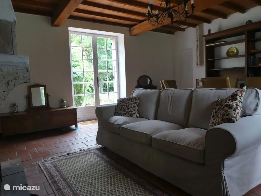 the spacious living room with fireplace