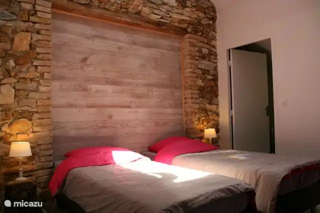 Slaapkamer 4 met twee aparte bedden, eventueel samen te voegen tot een 2-persoonsbed