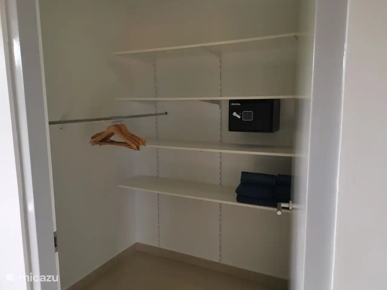 walk-in closet with safe