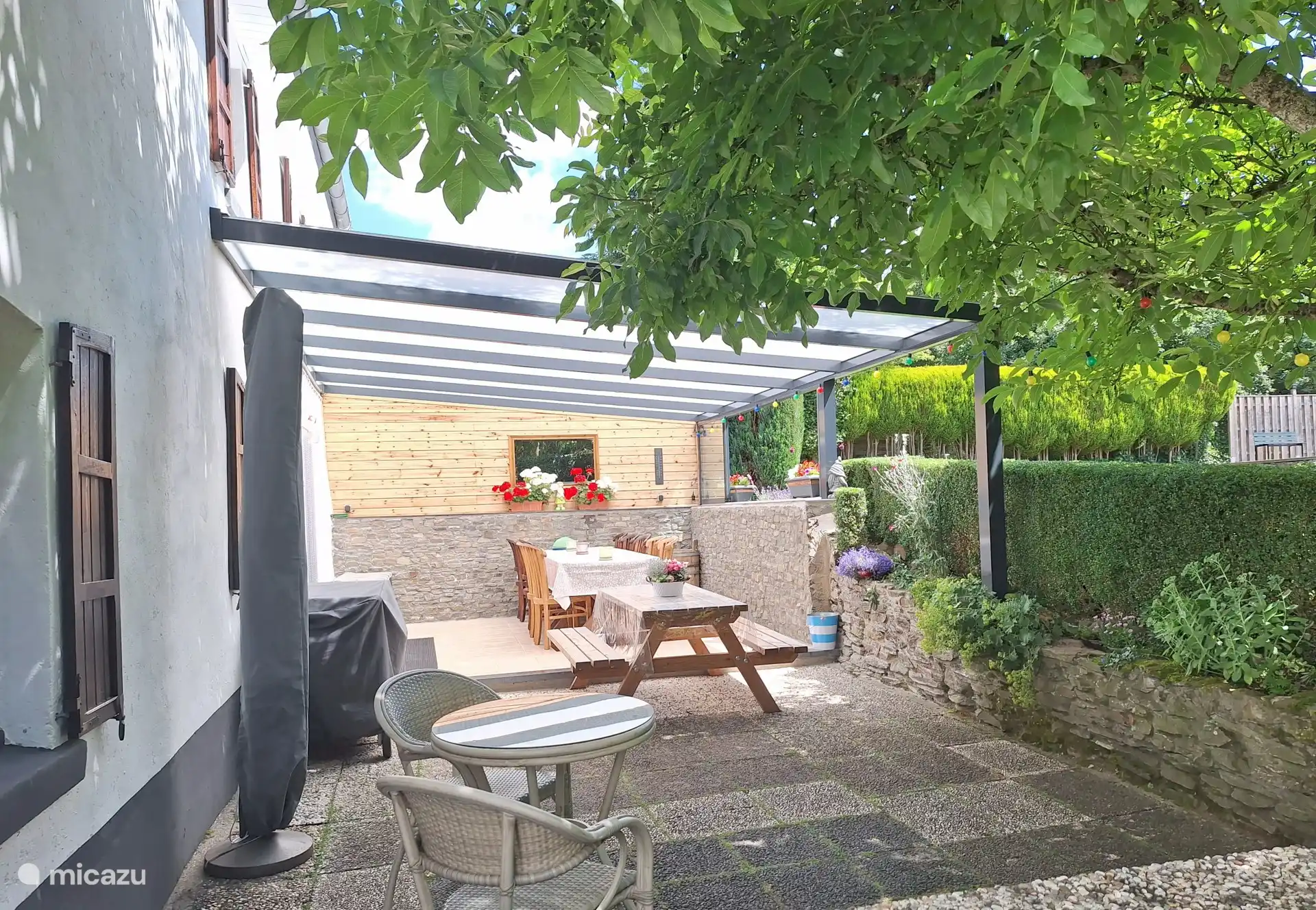 Covered terrace with BBQ