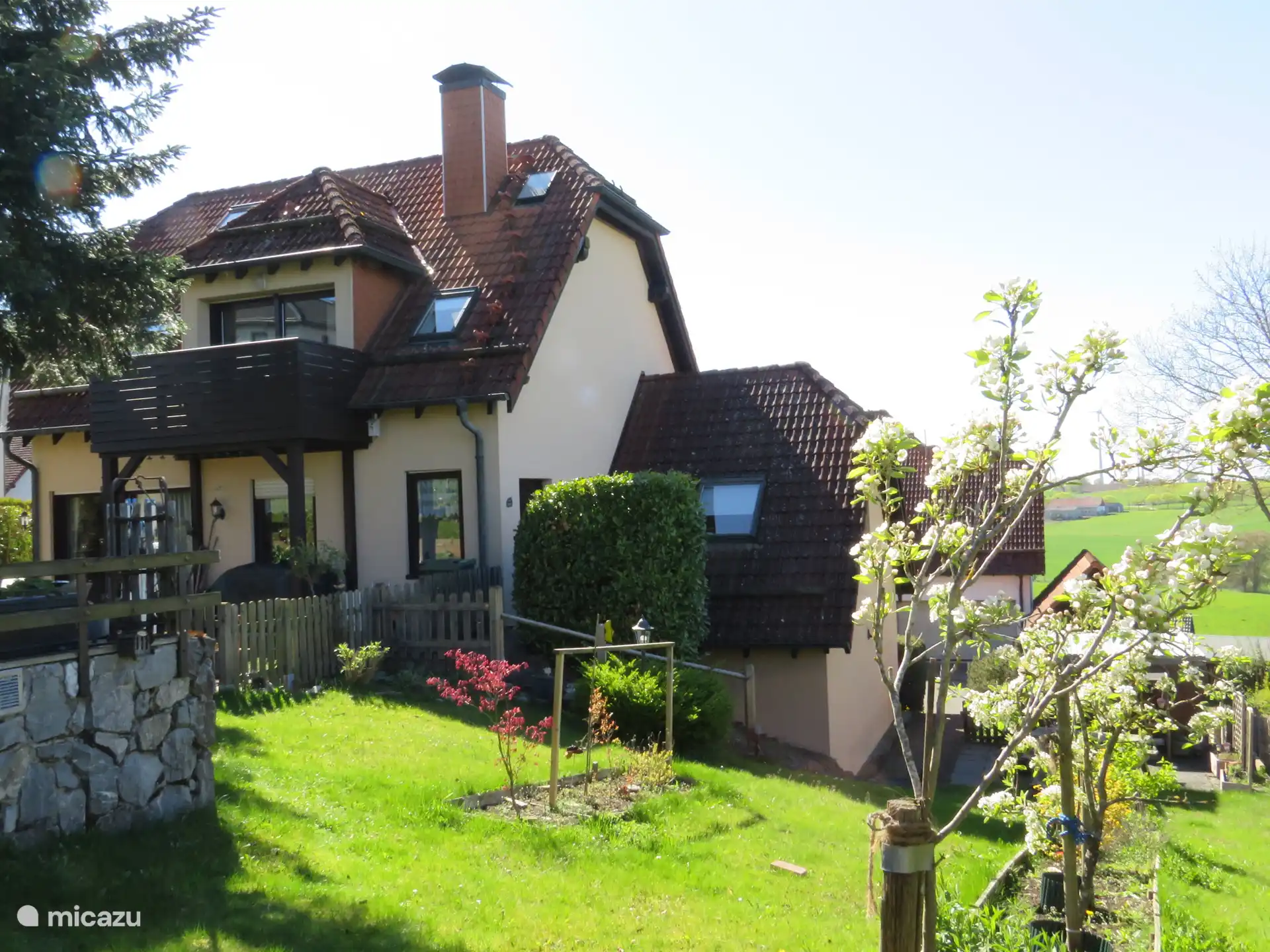 Our Ferienwohnung with balcony and entrance on the side.
