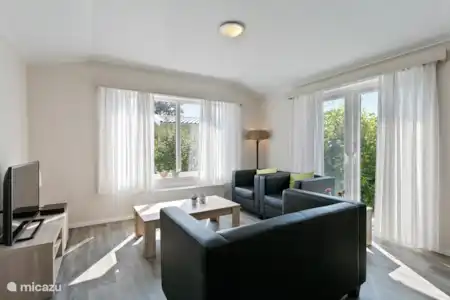 Vakantiehuis Nederland, Gelderland, Aalten chalet Chalet de Zwaluw Woonkamer