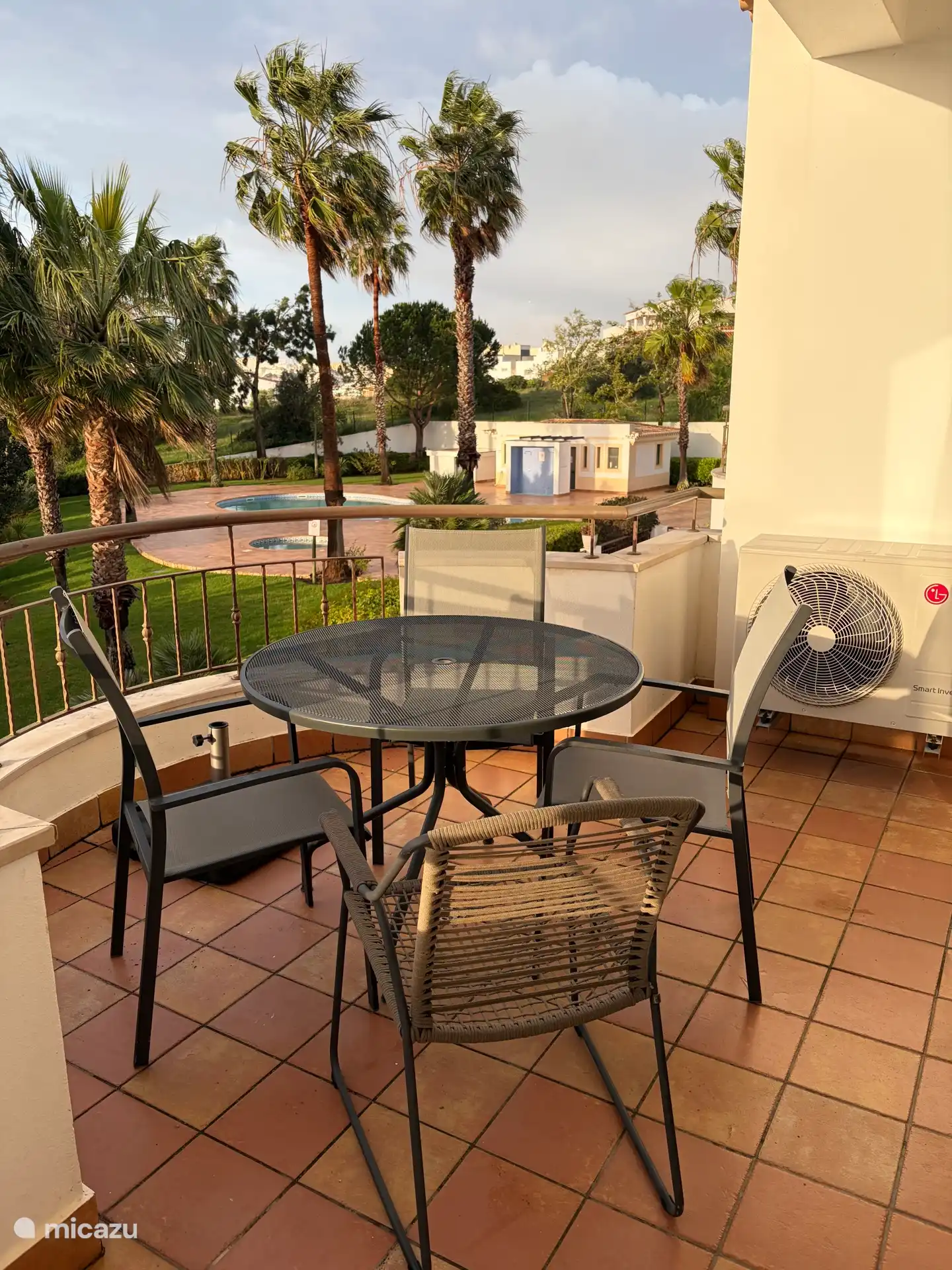 Balcony overlooking the pool and sea(not visible in this photo)