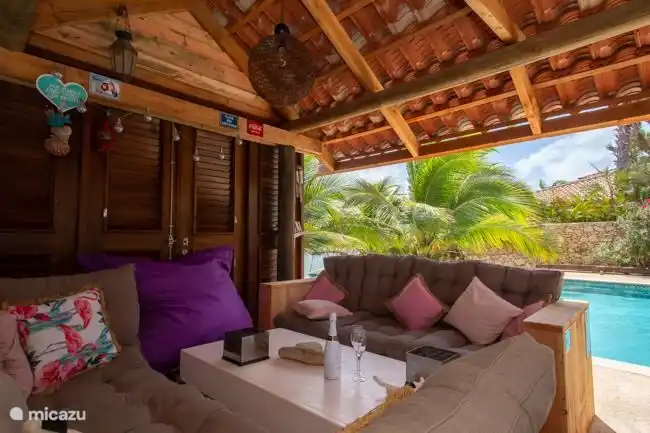 Relax in the shade on the lounge sofas