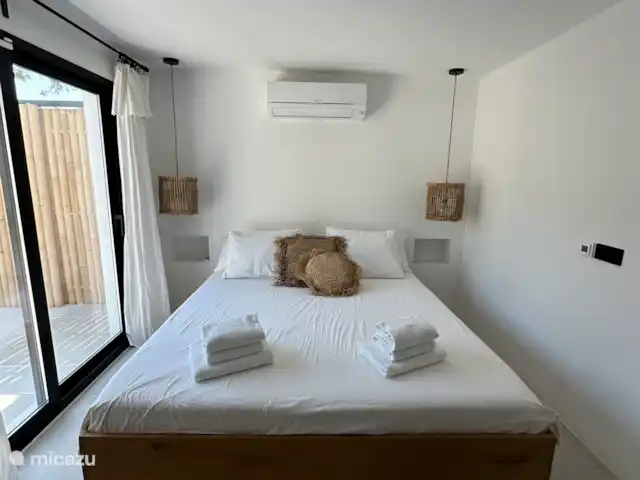 Location de Vacances Espagne, Ibiza, Sant Josep de sa Talaia, villa - Casa Makana Chambre au rez-de-chaussée avec terrasse